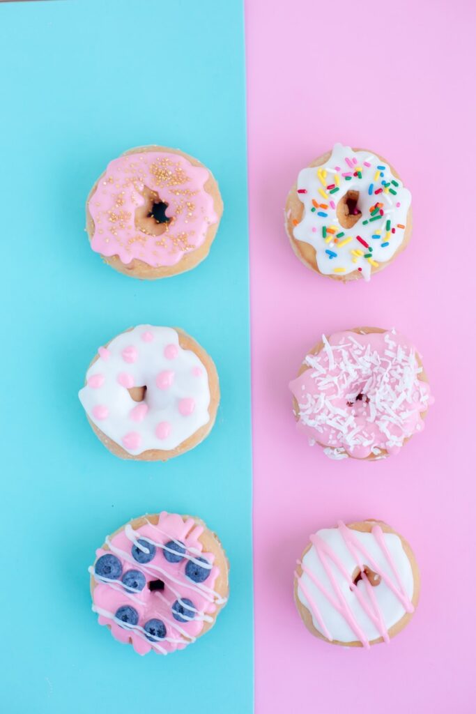 six assorted-flavor doughnuts